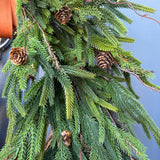 Fall greenery norfolk pine front door wreath with brass bells
