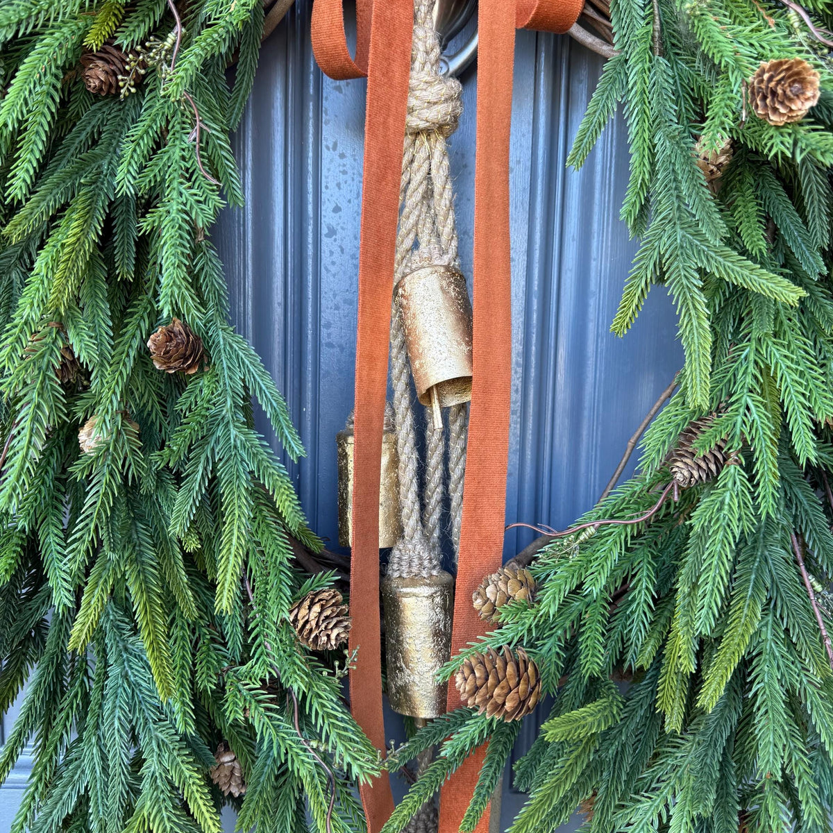 Fall greenery norfolk pine front door wreath with brass bells