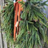 Fall greenery norfolk pine front door wreath with brass bells