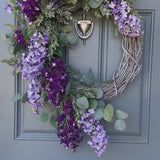 Lilac Spring Wreath with draping Eucalyptus and Ruscus on a Whitewashed Grapevine