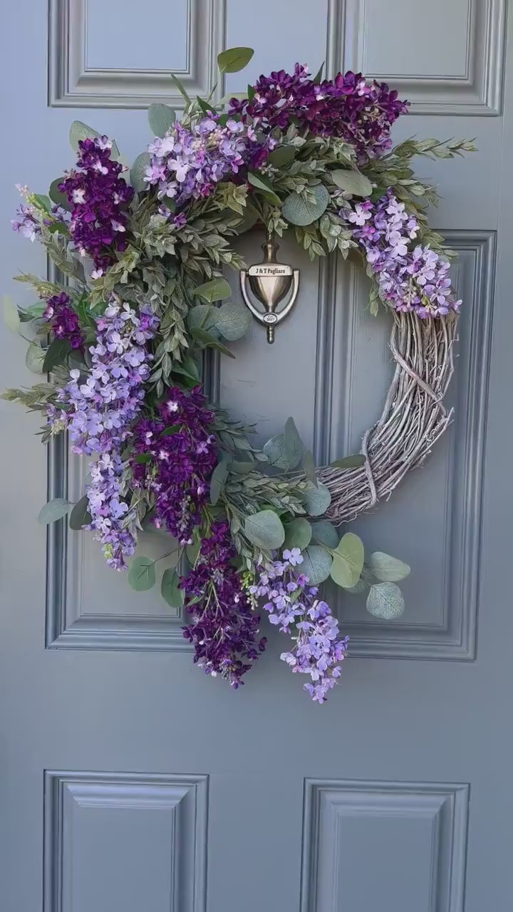 Lilac Spring Wreath with draping Eucalyptus and Ruscus on a Whitewashed Grapevine